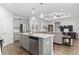 Bright kitchen with stainless steel appliances, gray cabinets, and a large island at 2405 Capri Court, Conway, SC 29527