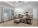 Spacious living room with a grey sofa and an open concept layout at 2405 Capri Court, Conway, SC 29527