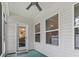 Charming screened in porch with white ceiling and door with view through house to dining room at 2405 Capri Court, Conway, SC 29527