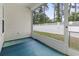 Screened in patio with view of white fence and lush backyard at 2405 Capri Court, Conway, SC 29527