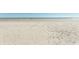 Expansive white sandy beach, with the ocean, under a clear sky at 2507 S Ocean Blvd., North Myrtle Beach, SC 29582