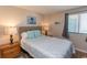 Cozy bedroom with a queen bed and soft, inviting decor and an ocean view at 2507 S Ocean Blvd., North Myrtle Beach, SC 29582