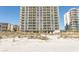 Exterior view of the beachfront condo complex from the beach showing balcony views at 2507 S Ocean Blvd., North Myrtle Beach, SC 29582