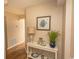 Hallway featuring beach-themed decor, table, and wood floors at 2507 S Ocean Blvd., North Myrtle Beach, SC 29582