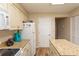 Kitchen with granite countertops and white appliances at 2507 S Ocean Blvd., North Myrtle Beach, SC 29582