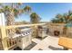 Outdoor grilling area with two stainless steel grills and ocean views at 2507 S Ocean Blvd., North Myrtle Beach, SC 29582