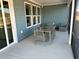 Inviting screened patio with outdoor seating, perfect for dining and relaxing at 2521 Watershed Way, Longs, SC 29568