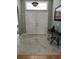 Elegant foyer featuring marble tile flooring, white double doors, and transom window at 3012 Winding River Rd., North Myrtle Beach, SC 29582