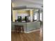 Open kitchen with a breakfast bar, stainless steel appliances, and modern countertops at 3012 Winding River Rd., North Myrtle Beach, SC 29582