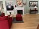 Comfortable living room with hardwood floors, fireplace, and built-in shelving at 3012 Winding River Rd., North Myrtle Beach, SC 29582