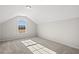 This bedroom boasts natural light from the window, plush carpet, and neutral walls at 339 Barn Owl Way, Conway, SC 29527