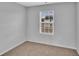 Neutral bedroom features a window that provides great natural light at 36 Cape Point Dr., Conway, SC 29527