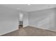 Neutral bedroom with carpet and doorway leading to bathroom with stylish vanity at 36 Cape Point Dr., Conway, SC 29527