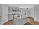 Modern kitchen features stainless steel appliances, granite countertops, and a stylish island with sink at 36 Cape Point Dr., Conway, SC 29527