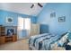 Coastal themed bedroom with vaulted ceiling, window, wardrobe, and comfortable bed at 3700 Golf Colony Lane # 6J, Little River, SC 29566