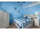 Bedroom featuring a vaulted ceiling, dresser, and nautical decorations at 3700 Golf Colony Lane # 6J, Little River, SC 29566