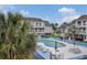 Inviting outdoor pool area with lounge chairs, perfect for relaxing and enjoying the resort lifestyle at 3700 Golf Colony Lane # 6J, Little River, SC 29566