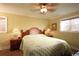 Serene bedroom features natural light, a ceiling fan, and a comfortable bed for a relaxing retreat at 3709 N Ocean Blvd., North Myrtle Beach, SC 29582