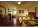 Comfortable bedroom with hardwood floors, a ceiling fan, and two cozy beds for a relaxing space at 3709 N Ocean Blvd., North Myrtle Beach, SC 29582
