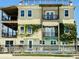 Charming, multi-story home with lush greenery, multiple balconies, and covered decks, creating a serene outdoor living space at 3709 N Ocean Blvd., North Myrtle Beach, SC 29582