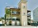 Unique multi-story home with multiple balconies and tower design, offering stunning architectural details at 3709 N Ocean Blvd., North Myrtle Beach, SC 29582