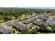 Expansive aerial shot showcases community apartments with an inviting pool, surrounded by lush greenery and parking at 3795 Hitchcock Way # 618, Myrtle Beach, SC 29577