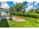 Backyard featuring patio, lush lawn, and black metal fence at 395 Dunbarton Ln., Conway, SC 29526