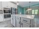 Bright kitchen with a large island, stainless steel appliances, and stylish countertops at 395 Dunbarton Ln., Conway, SC 29526