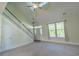 Bright living room offers natural light, high ceilings, and easy access to the staircase and front door at 395 Dunbarton Ln., Conway, SC 29526