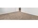 Spacious carpeted bedroom with white trim, open doorway and ample electrical outlets and neutral wall color at 40 Cape Point Dr., Conway, SC 29527