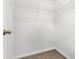 A walk-in closet with carpeted floors, white walls and wire shelving racks ready for storage at 40 Cape Point Dr., Conway, SC 29527