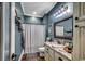 Bathroom with granite countertops, single sink, and rustic framed mirror at 4260 Long Avenue Ext., Conway, SC 29526