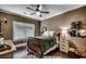 Bedroom features ceiling fan, neutral decor, and natural light at 4260 Long Avenue Ext., Conway, SC 29526