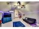Cozy bedroom features carpet, ceiling fan, tv, air conditioner and futon at 4260 Long Avenue Ext., Conway, SC 29526