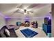 Bonus room is large and spacious, with a ceiling fan and LED strip lighting at 4260 Long Avenue Ext., Conway, SC 29526