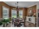 Cozy dining area with ample natural light, perfect for Gathering meals and gatherings at 4260 Long Avenue Ext., Conway, SC 29526