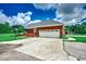 Large two-car garage and driveway with basketball court at 4260 Long Avenue Ext., Conway, SC 29526
