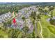Aerial view showing the condo buildings along the golf course and other community buildings at 4787 Wild Iris Dr. # 303, Myrtle Beach, SC 29577