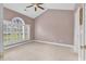 Bright bedroom with a vaulted ceiling, large windows, and neutral colors, creating a peaceful retreat at 4787 Wild Iris Dr. # 303, Myrtle Beach, SC 29577