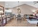 Spacious living area featuring a sofa, dining table, and contemporary decor at 4787 Wild Iris Dr. # 303, Myrtle Beach, SC 29577