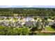 Aerial view of 4818 Harvest Dr, a home nestled in a neighborhood near a scenic pond at 4818 Harvest Dr., Myrtle Beach, SC 29579