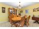 Formal dining area featuring classic furnishings, a decorative chandelier, and ample seating at 4818 Harvest Dr., Myrtle Beach, SC 29579