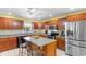 Spacious kitchen featuring stainless appliances, granite countertops, and an island with seating at 4818 Harvest Dr., Myrtle Beach, SC 29579