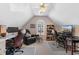 Home office space with vaulted ceilings, dual desks, and comfortable seating at 4818 Harvest Dr., Myrtle Beach, SC 29579