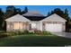 Charming two-story home with stone accents, manicured lawn, and inviting curb appeal at 4857 Hopespring St., Myrtle Beach, SC 29579