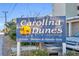 Prominent sign for Carolina Dunes at Cherry Grove, welcoming private owners and guests to the community at 5806 N Ocean Blvd. # 203, North Myrtle Beach, SC 29582