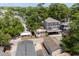 An aerial view showcases the home's location amongst beautiful mature trees and neighboring houses at 6001 - 1820A S Kings Hwy., Myrtle Beach, SC 29575