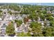 An aerial view showcases the home's location close to the beach and amongst a bustling neighborhood at 6001 - 1820A S Kings Hwy., Myrtle Beach, SC 29575