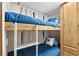 Bunk beds featuring wood frame, blue comforters and beach decor pillows at 6001 - 1820A S Kings Hwy., Myrtle Beach, SC 29575