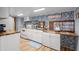 Well-lit kitchen featuring white cabinets, butcher block countertops, and cute beachy wallpaper at 6001 - 1820A S Kings Hwy., Myrtle Beach, SC 29575